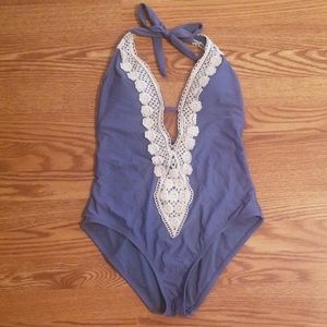 Low cut one piece bathing suit